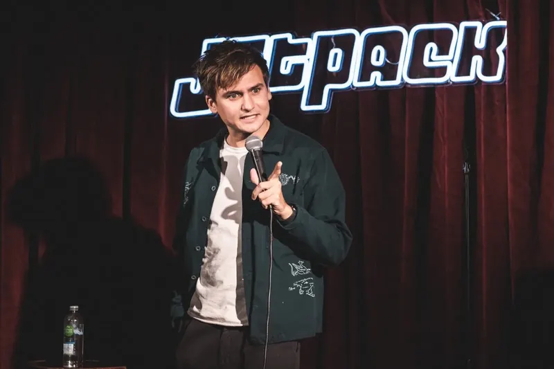A comedian on the Jetpack stage