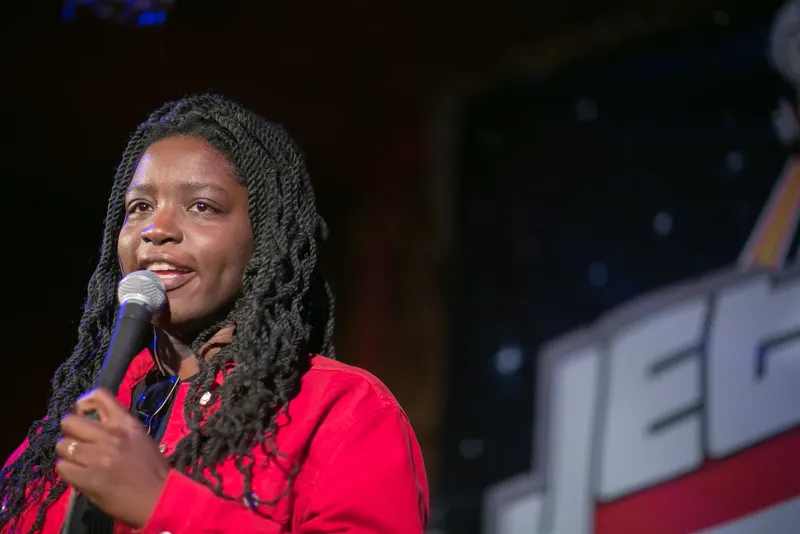 A comedian on the Jetpack stage